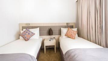 Minibar, iron/ironing board, free WiFi, alarm clocks