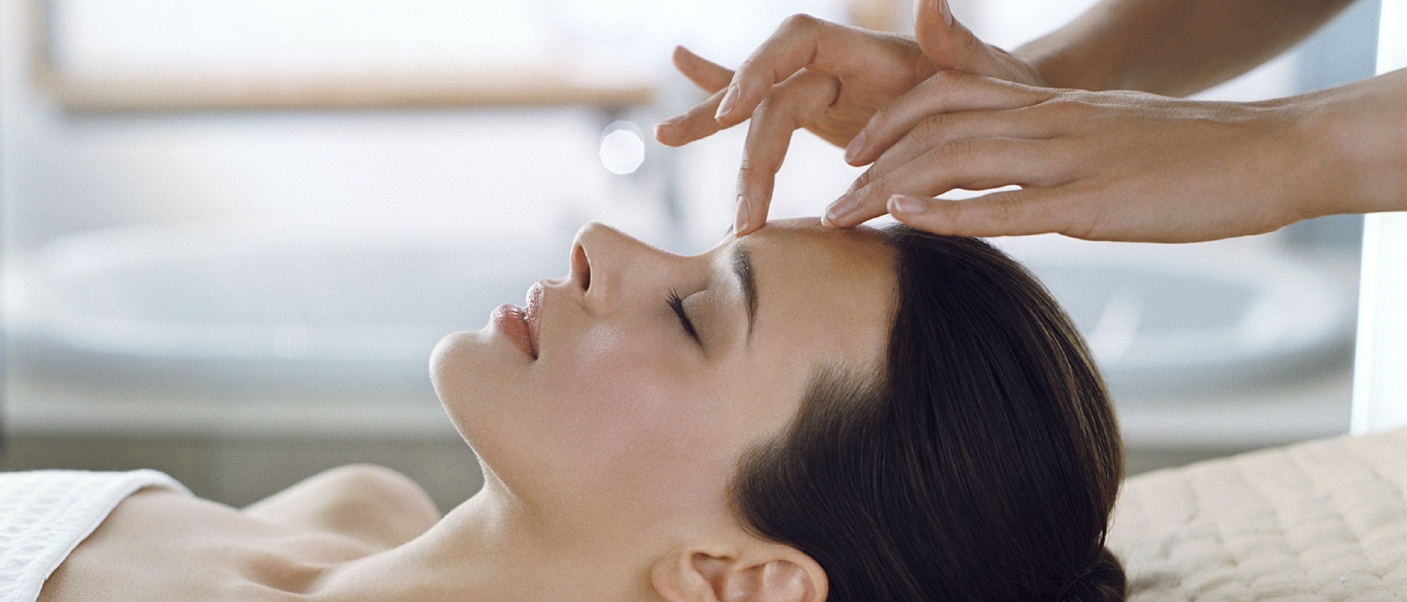 A person receiving a facial treatment.