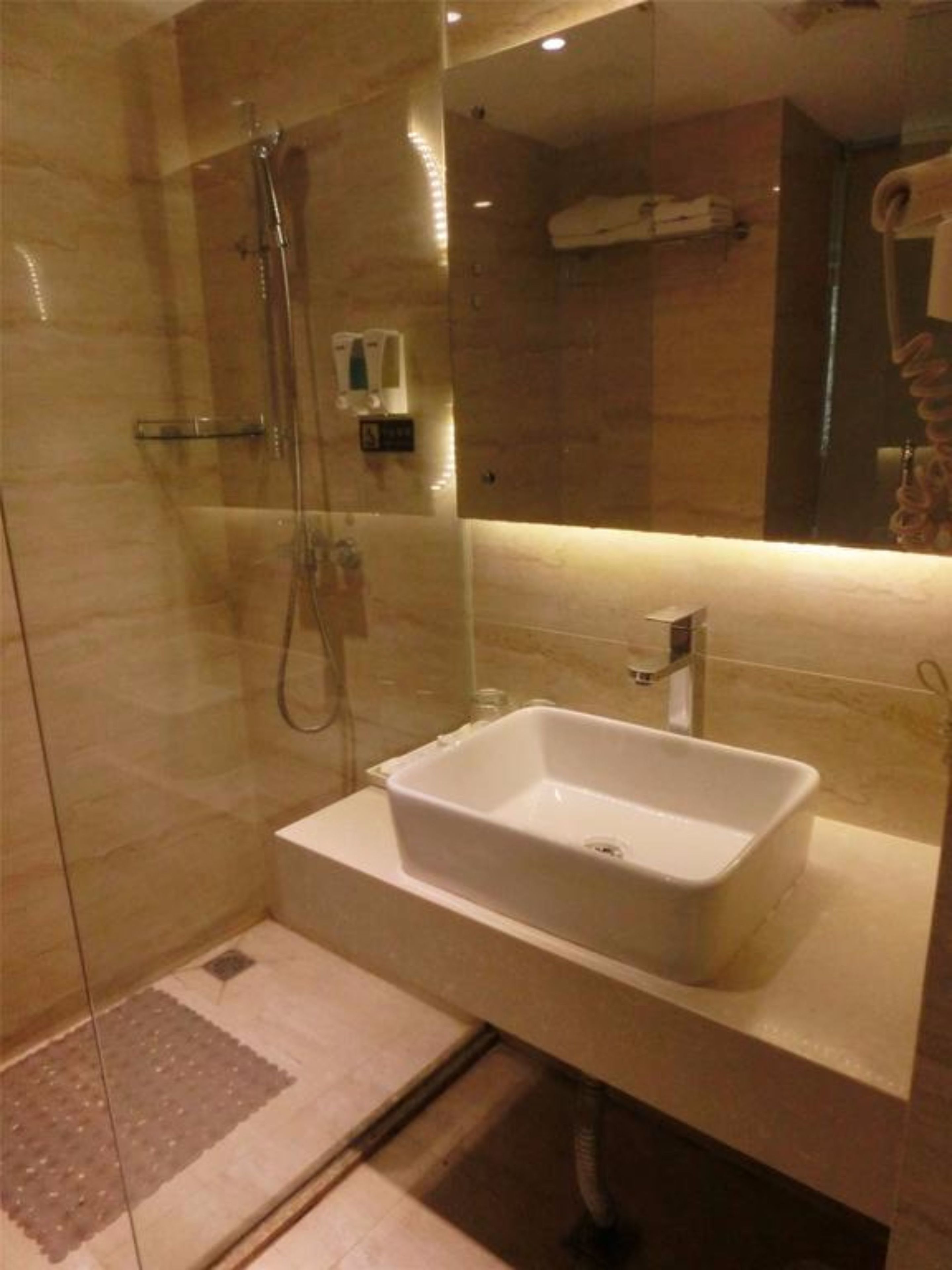 Shower, free toiletries, hair dryer, slippers