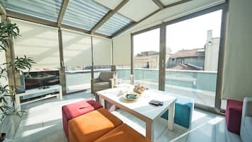 Exclusive Penthouse, 1 Bedroom | Living area | 80-cm LCD TV with satellite channels, TV, DVD player