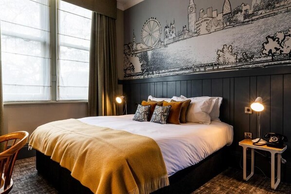 Minibar, in-room safe, individually decorated, desk