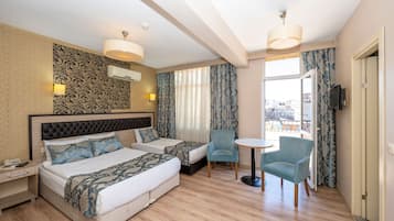 Premium bedding, pillow-top beds, minibar, in-room safe