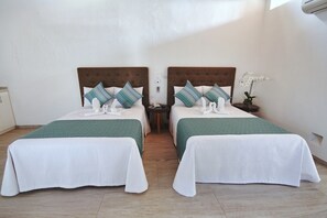 Twin Room, 2 Double Beds | Free WiFi, bed sheets - Los Milagros Hotel (Cabo San Lucas)