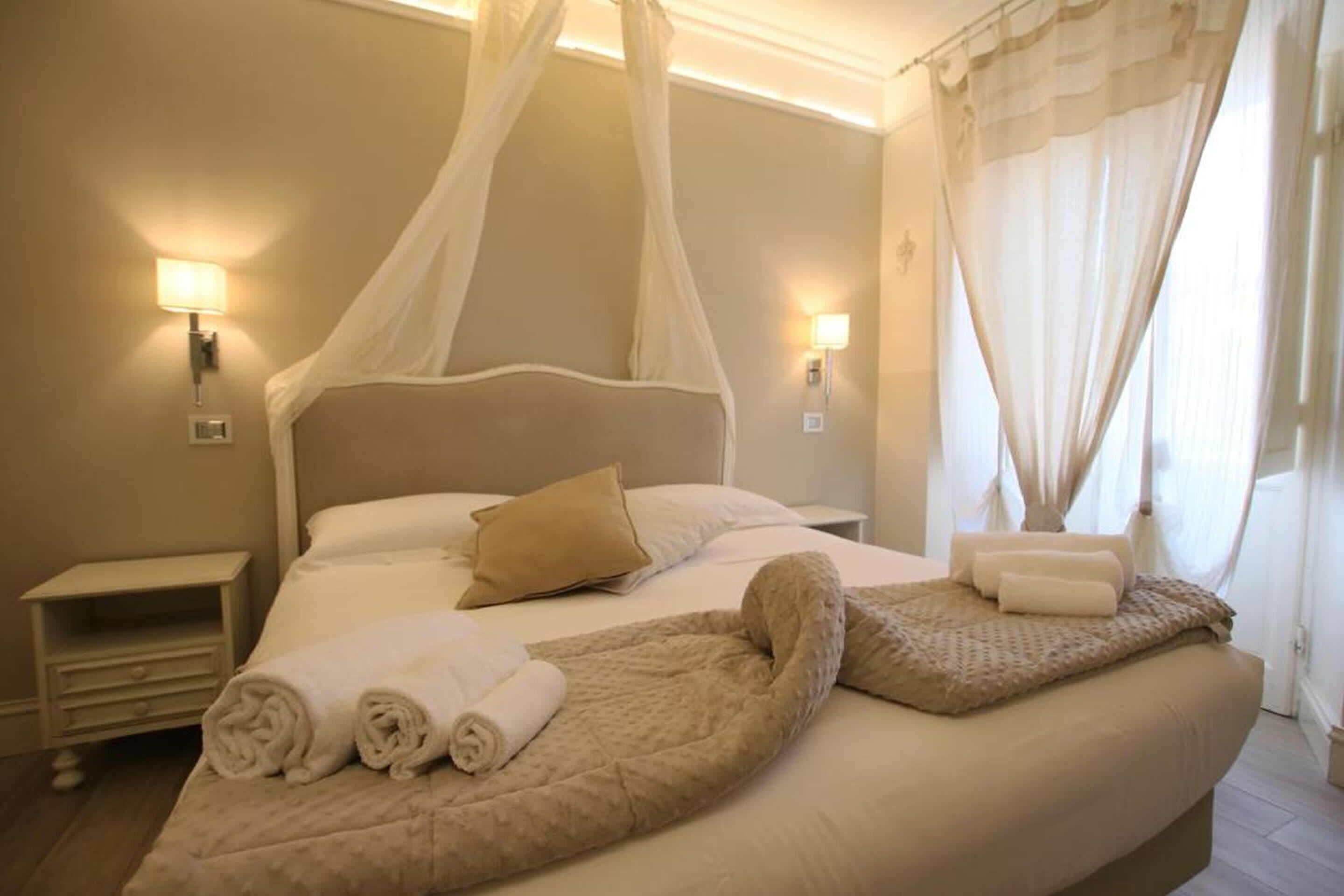 down duvets, pillow-top beds, desk, blackout curtains