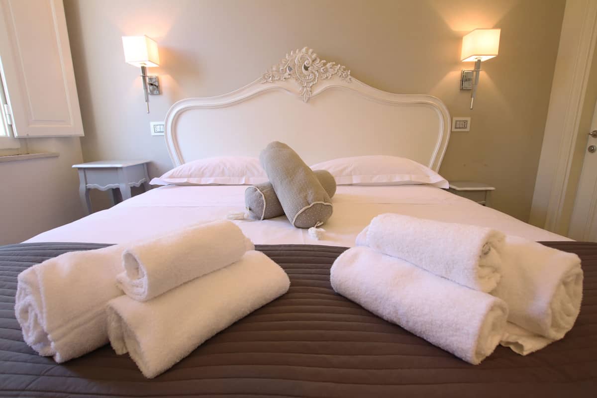 Down duvets, pillow-top beds, desk, blackout curtains