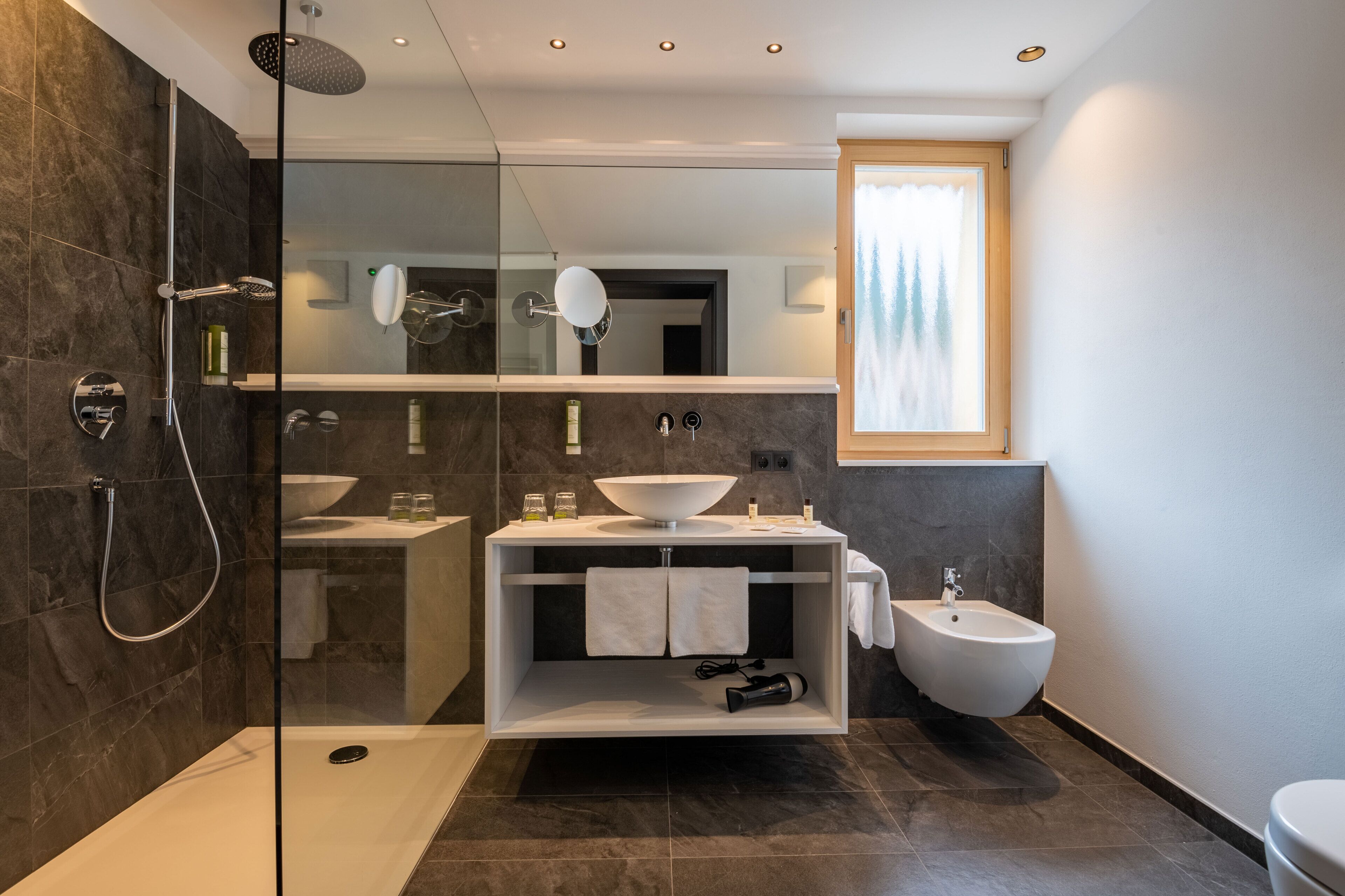 superior double room | bathroom | deep-soaking bathtub, hair dryer, bathrobes, slippers