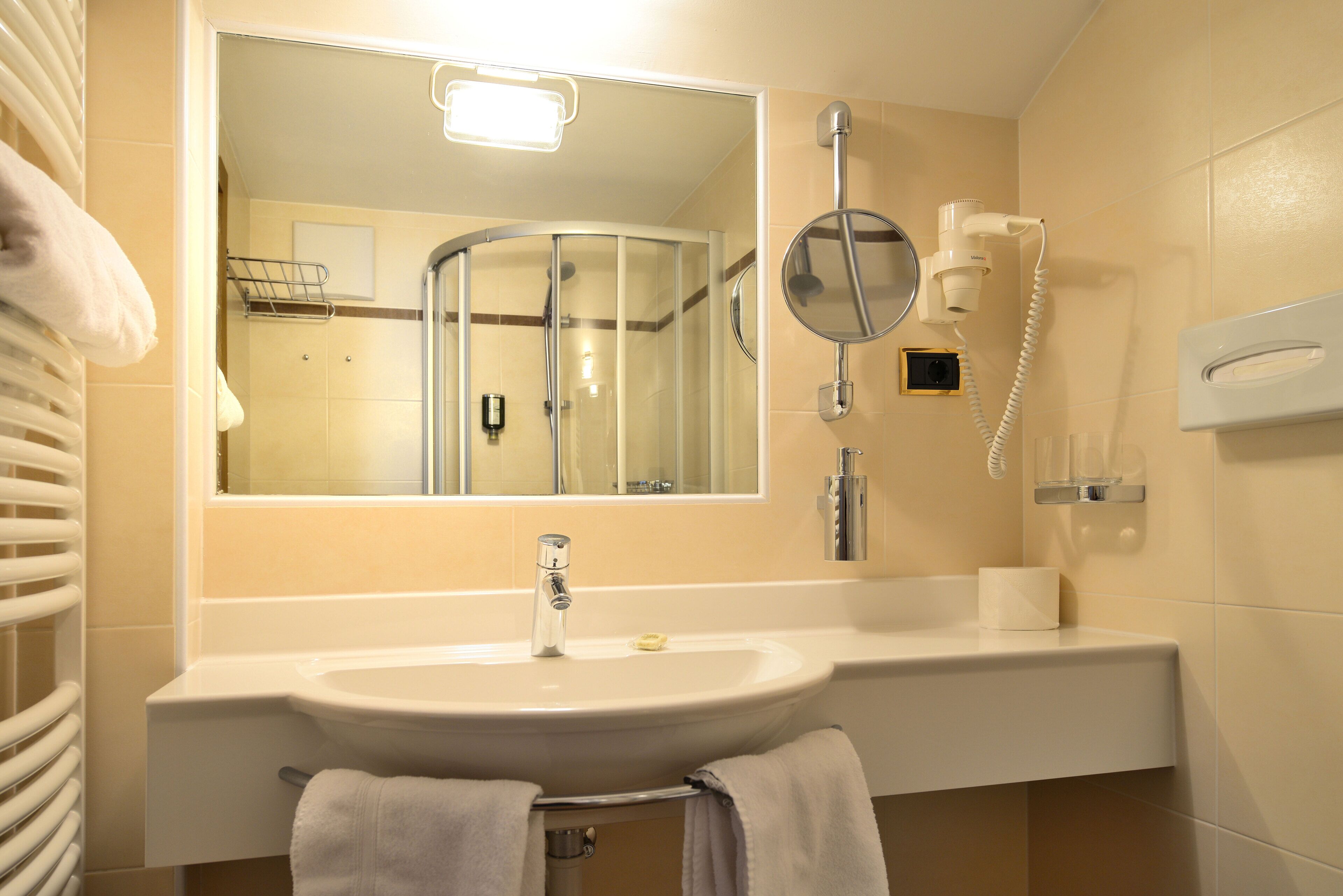 deep-soaking bathtub, hair dryer, bathrobes, slippers