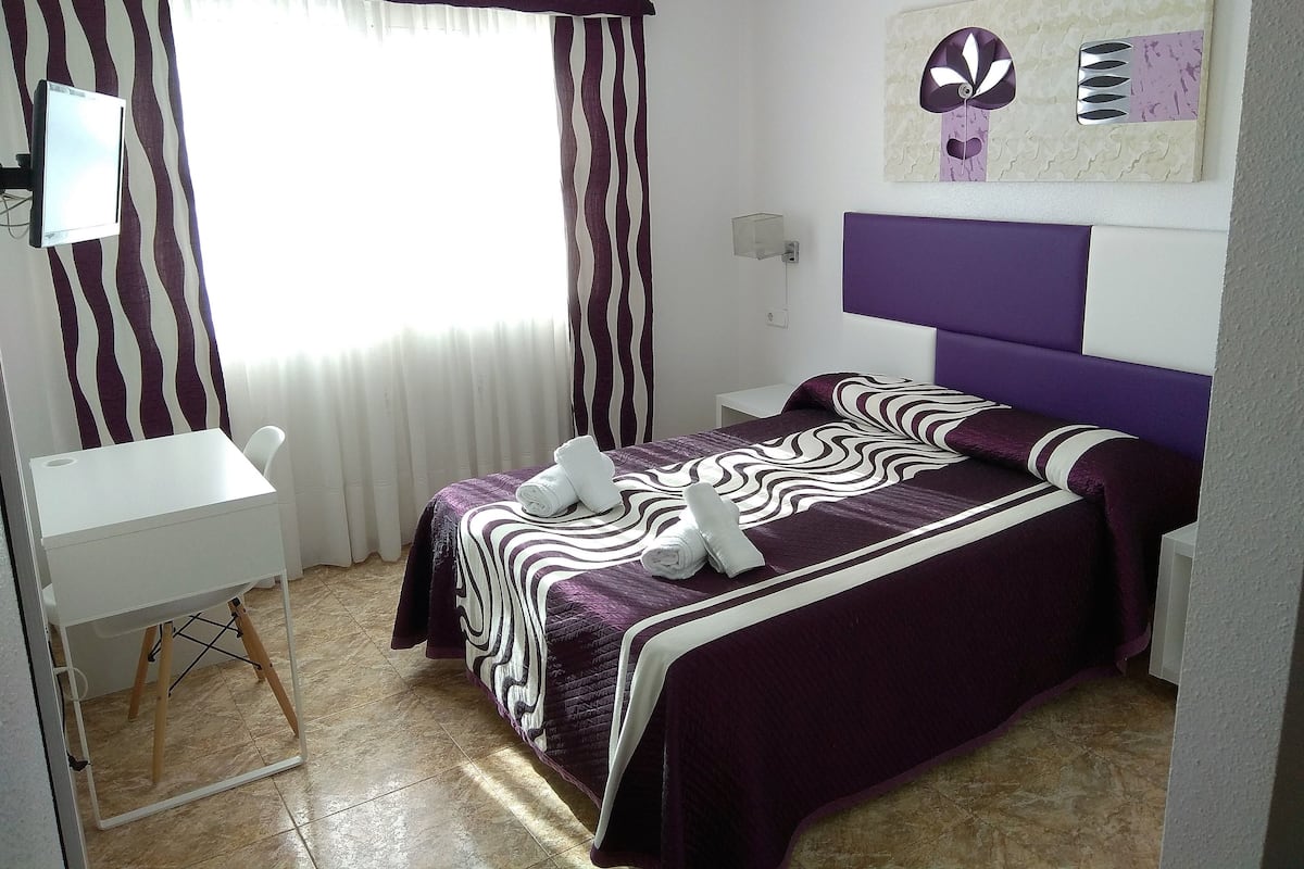 Desk, free WiFi, bed sheets