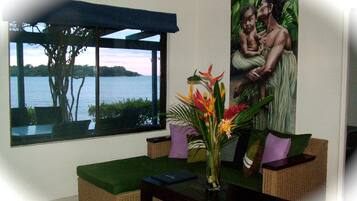 Standard Apartment, 2 Bedrooms, Lagoon View | Living room | 32-inch LCD TV with satellite channels, TV, DVD player