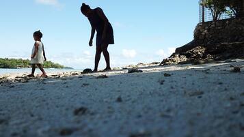 Walking along the beach, guests can enjoy the ocean views and scenic coastline.