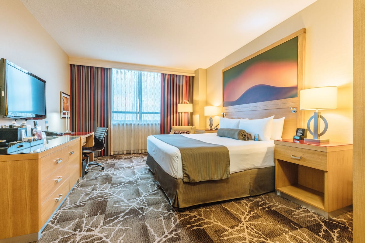 1 king bed (hotel tower- sky bridge to casino) | living area | 42-inch lcd tv with cable channels, tv, ipod dock