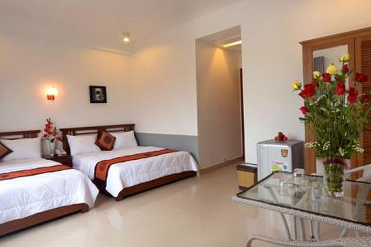 Family Room | Minibar, in-room safe, WiFi (free), individually decorated