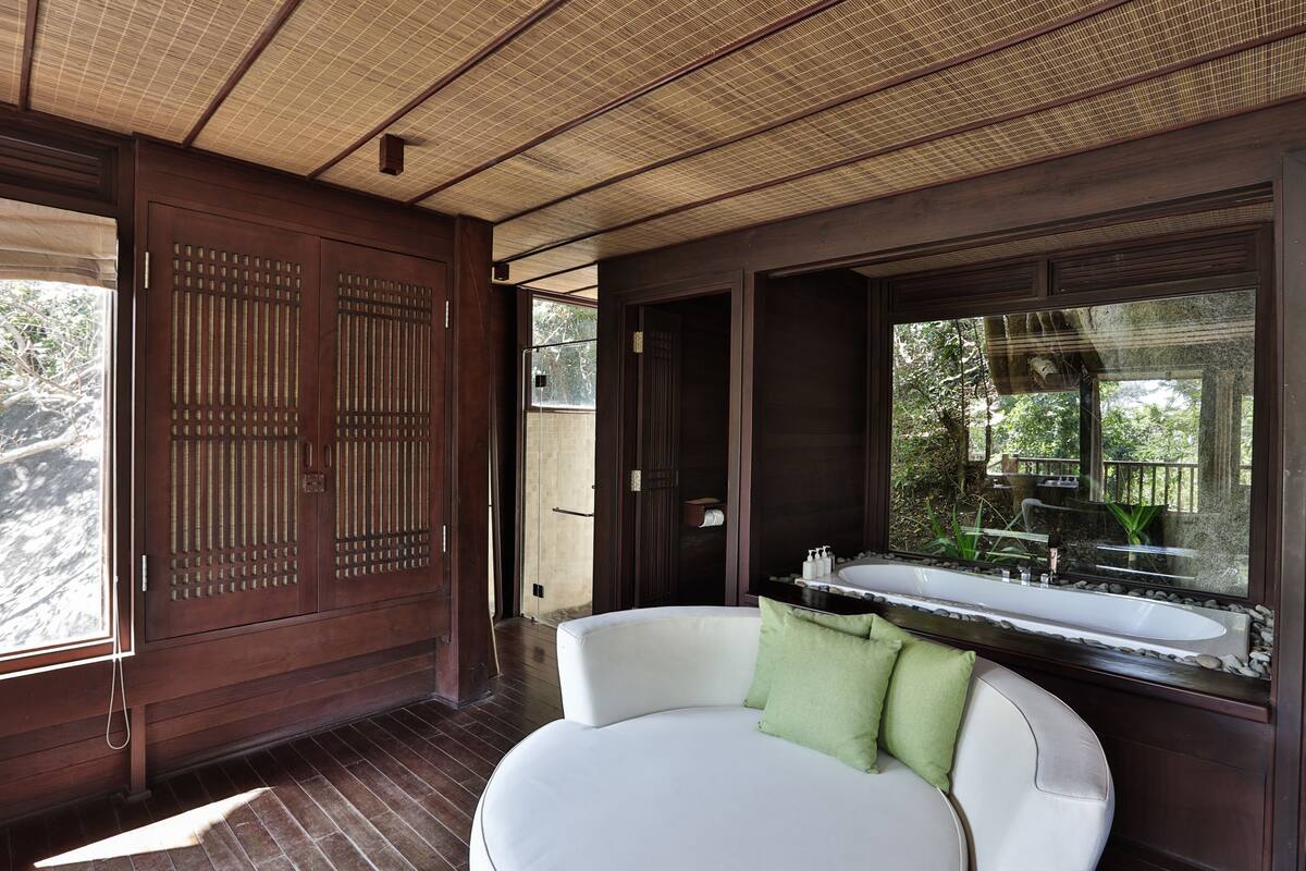 hill rock pool villa | bathroom | separate bathtub and shower, rainfall showerhead, designer toiletries