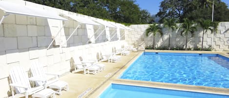 Outdoor pool, open 7:00 AM to 7:00 PM, sun loungers