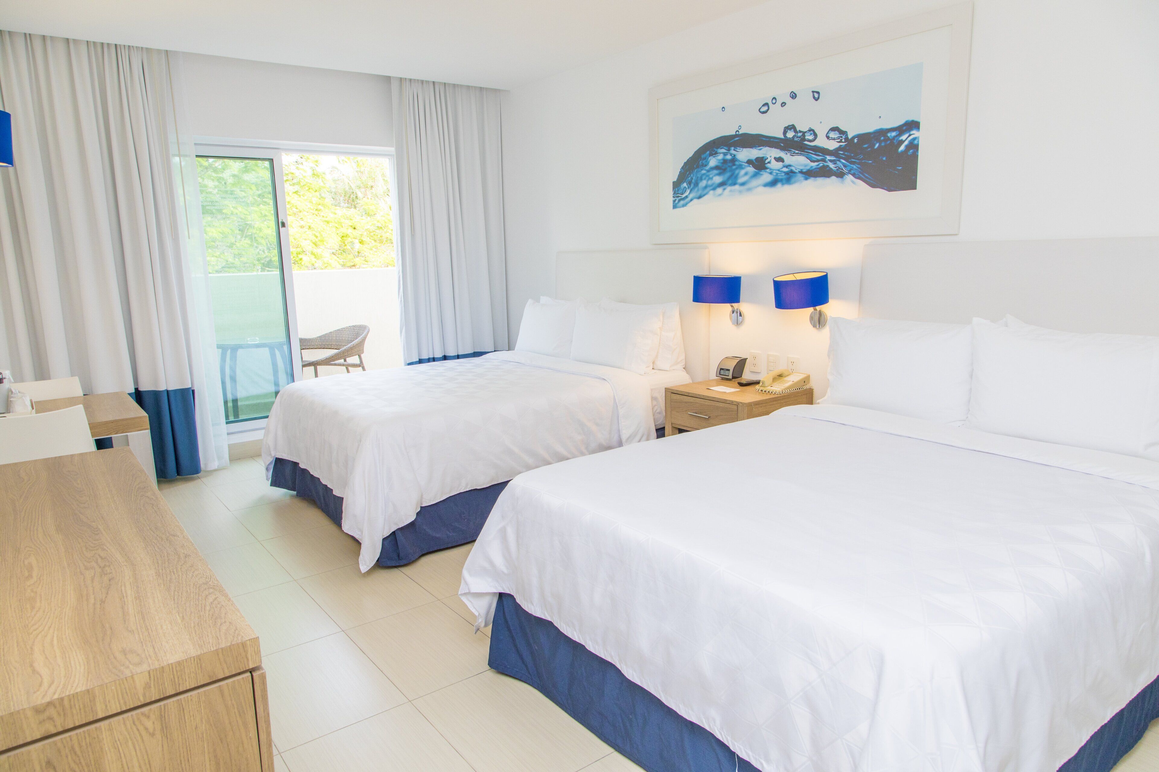 standard room, 2 queen beds, balcony | premium bedding, down duvets, in-room safe, desk