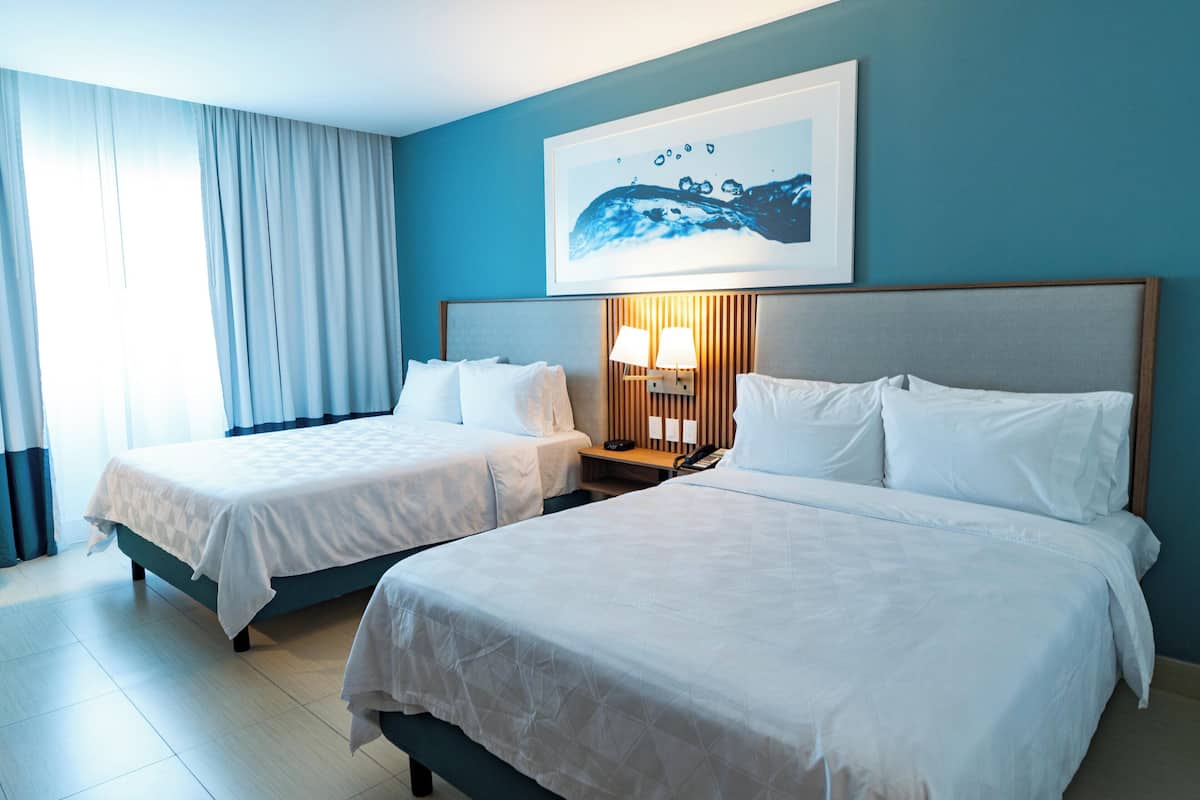 Premium bedding, down duvets, in-room safe, desk