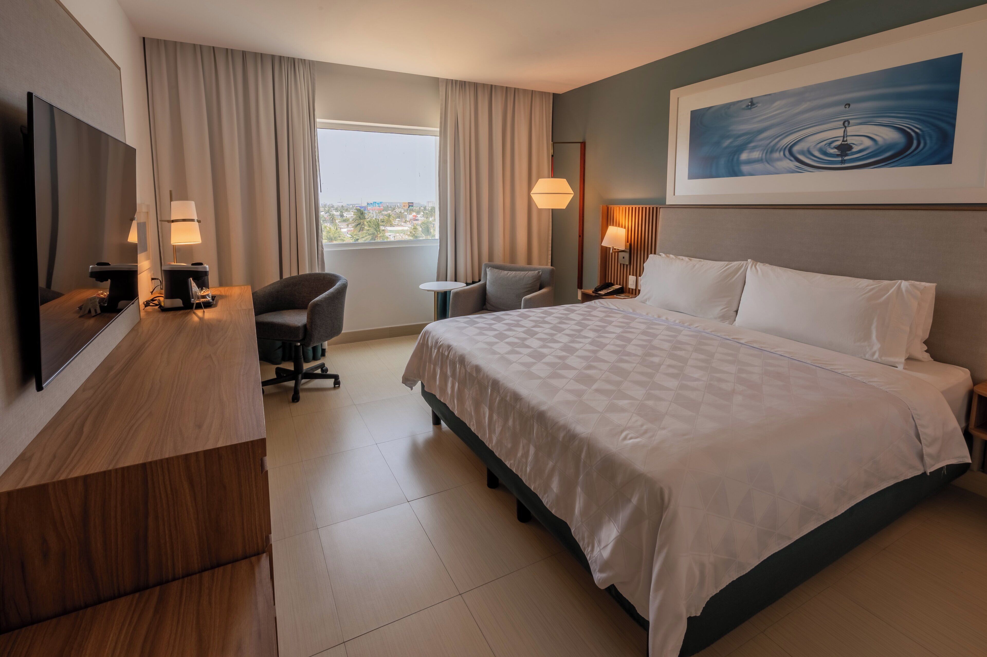 Premium bedding, down duvets, in-room safe, desk