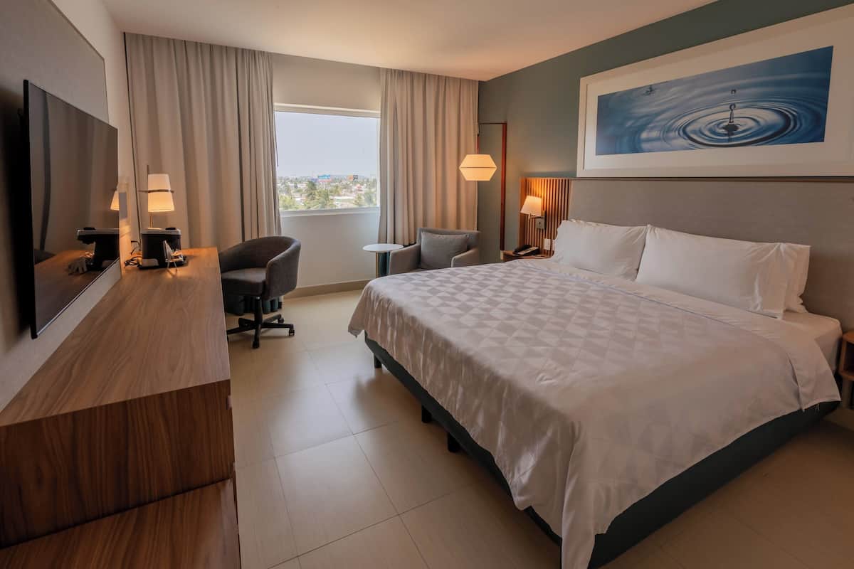 Premium bedding, down duvets, in-room safe, desk