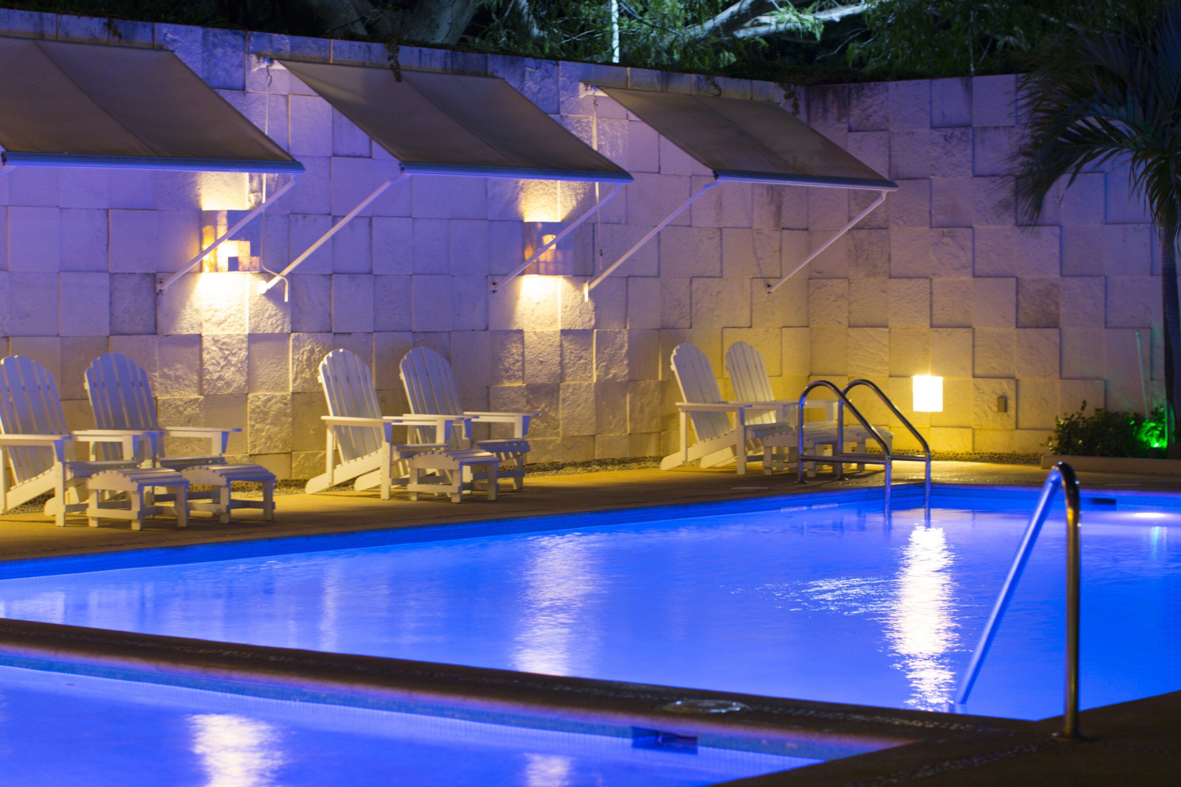 outdoor pool, open 7:00 am to 7:00 pm, pool loungers