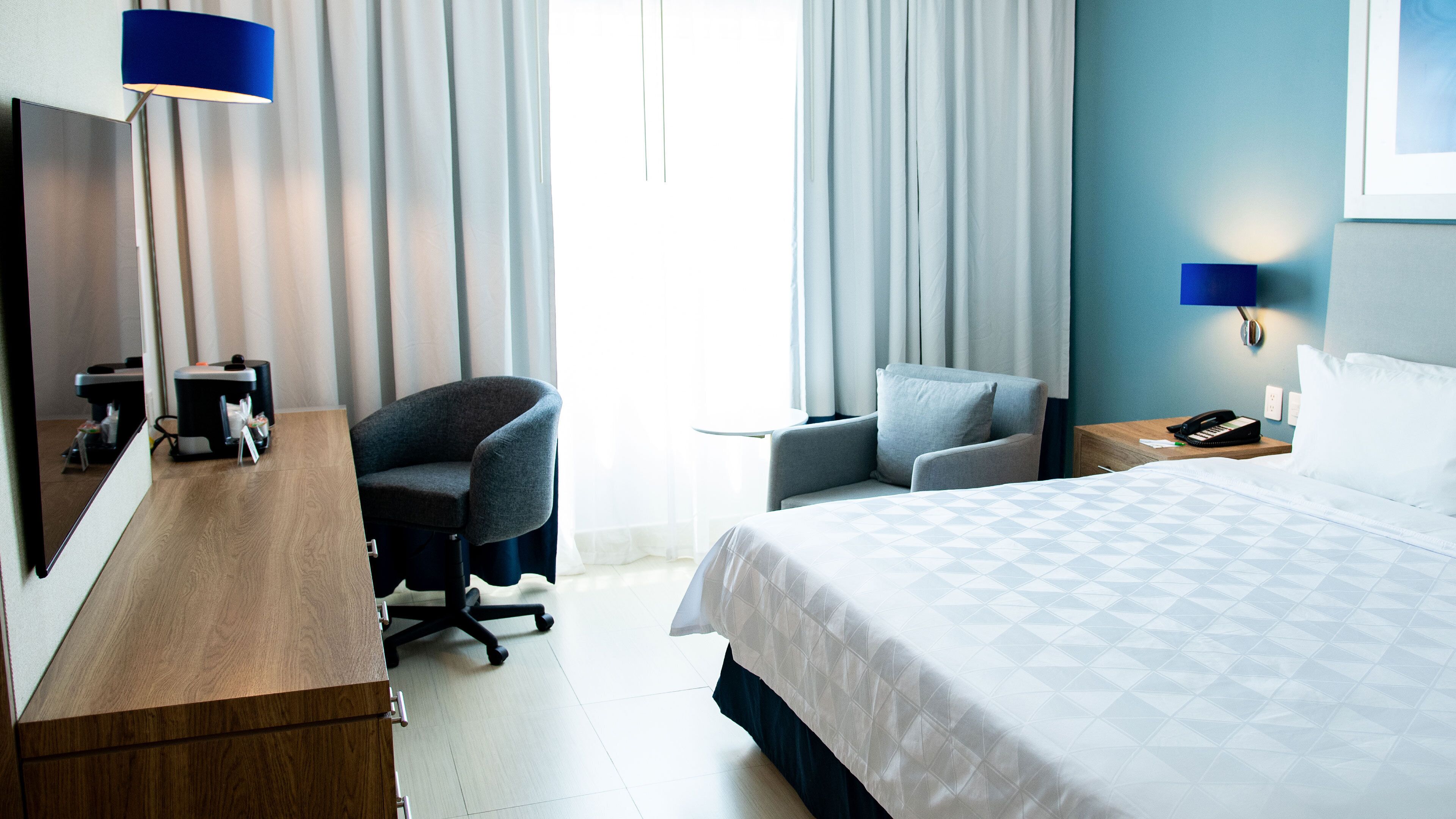 Premium bedding, down duvets, in-room safe, desk