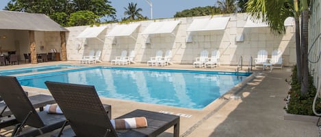 Outdoor pool, open 7:00 AM to 7:00 PM, sun loungers