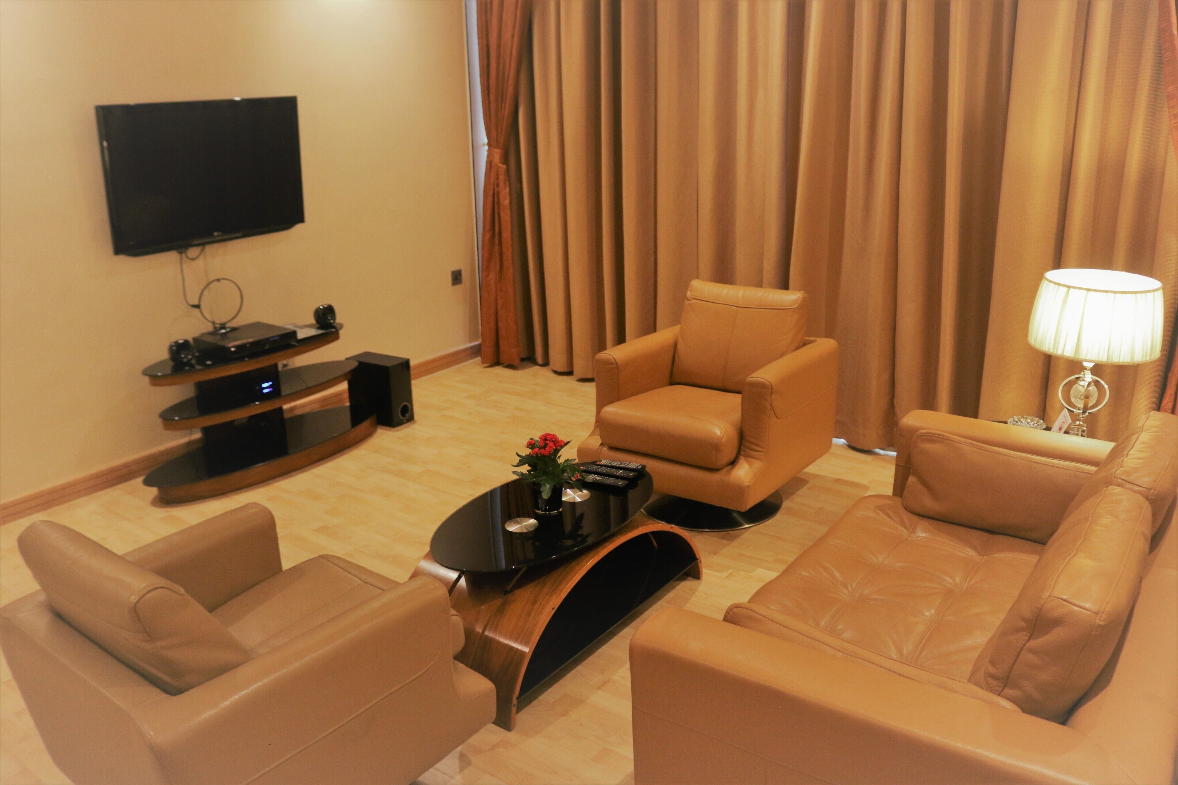 suite, 1 bedroom, kitchenette (crystal) | living area | led tv, dvd player