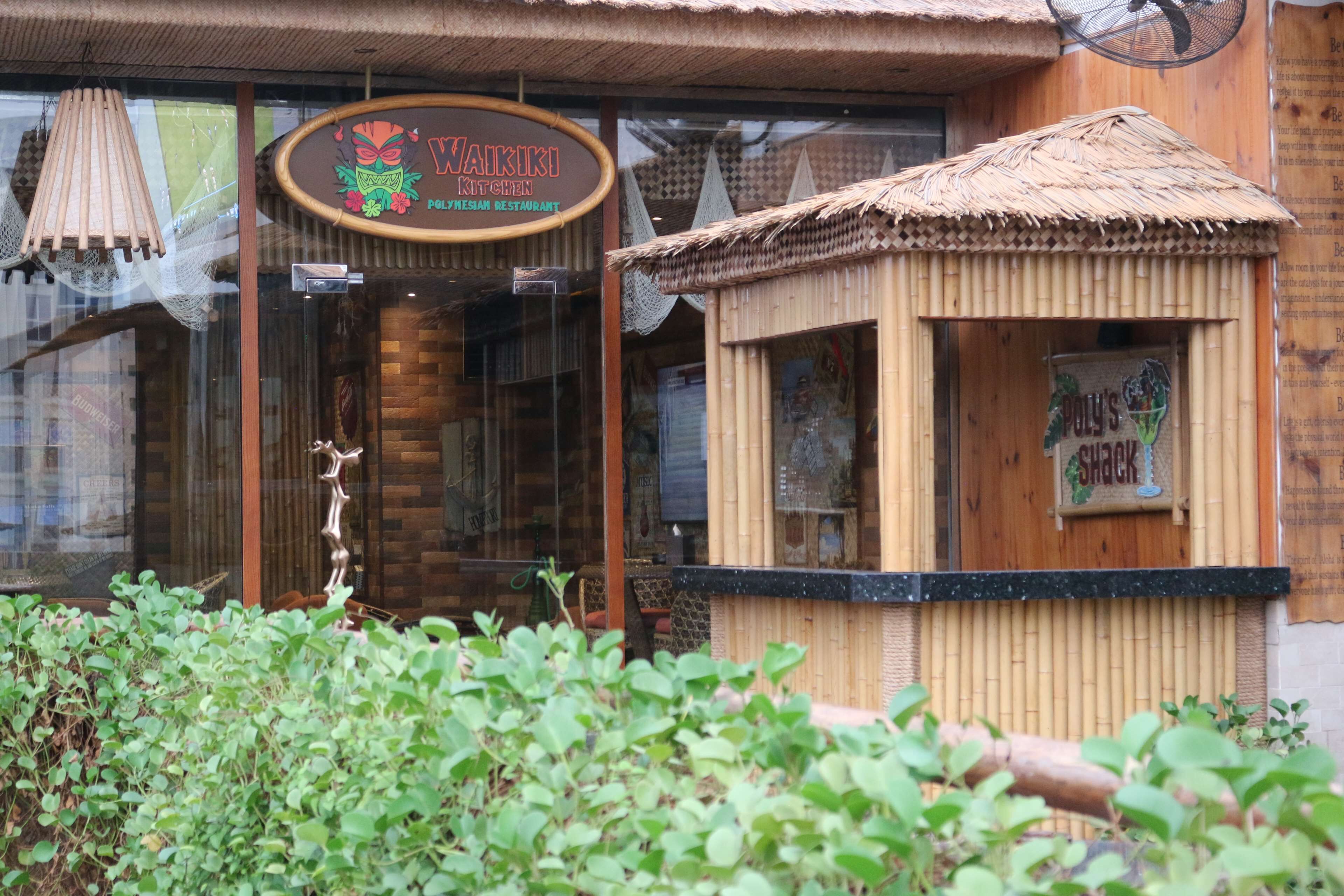 cocktail bar, poolside views, open selected days