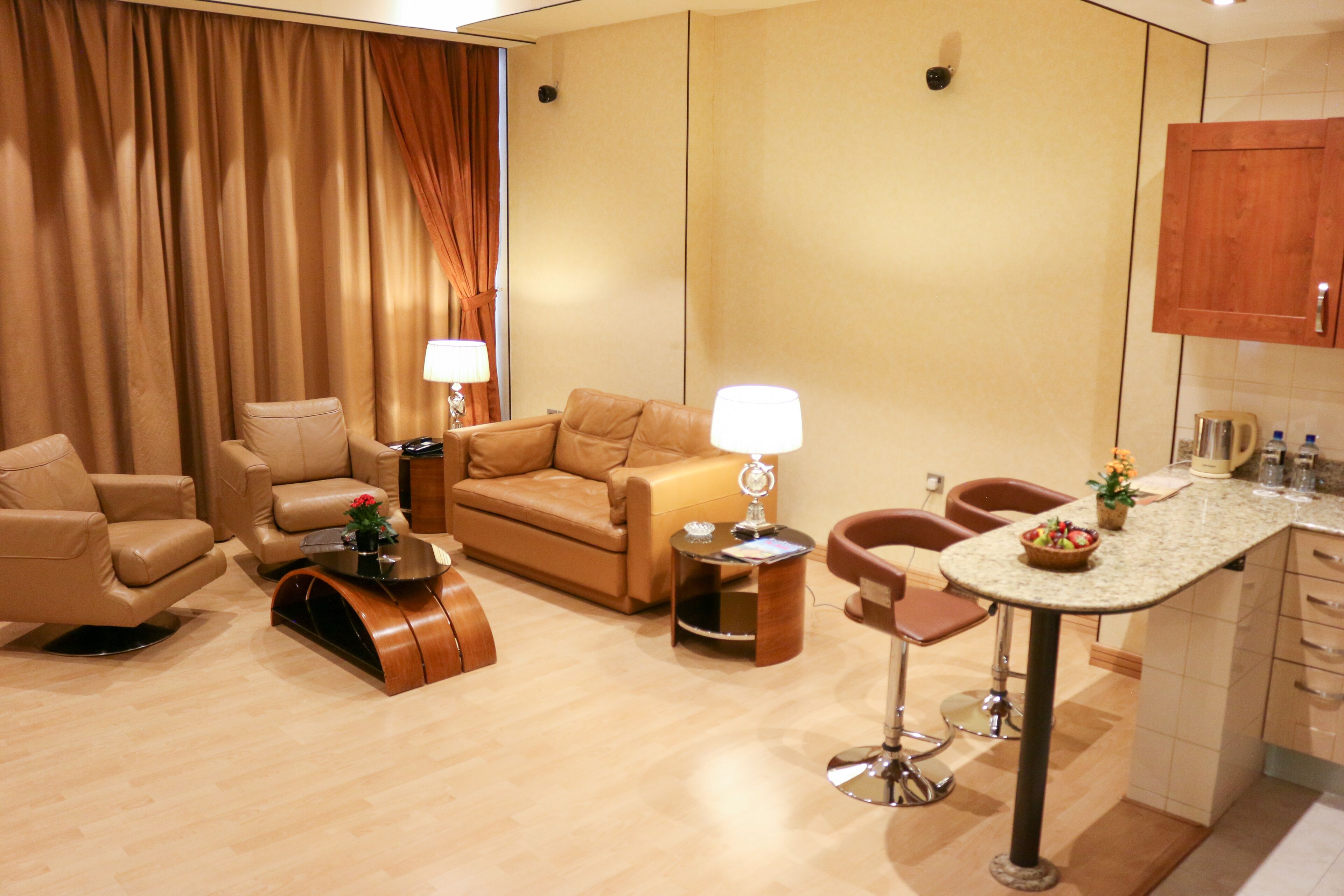 royal suite, 1 bedroom, kitchenette | living area | led tv, dvd player