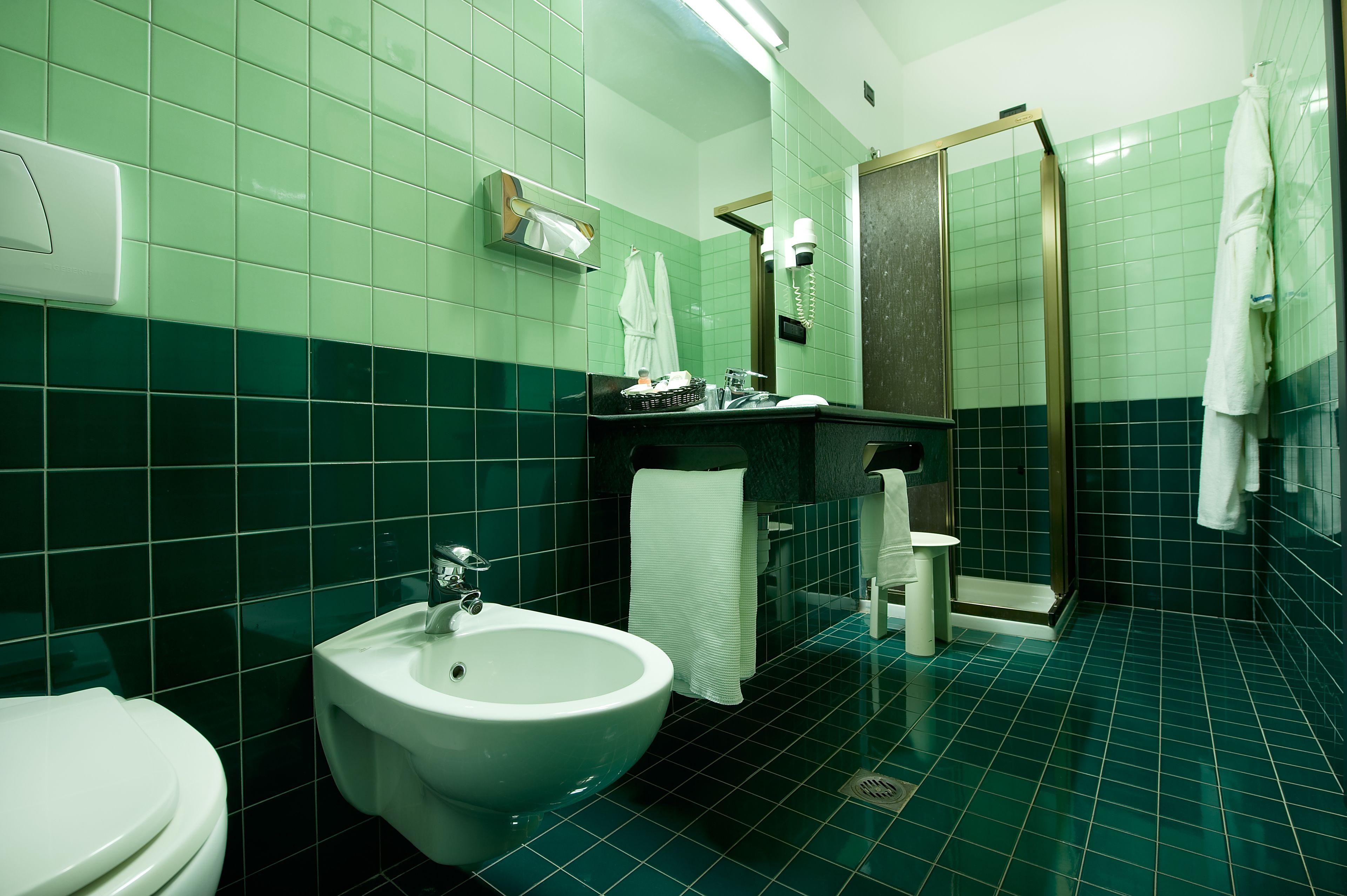 rainfall showerhead, designer toiletries, hair dryer, bathrobes