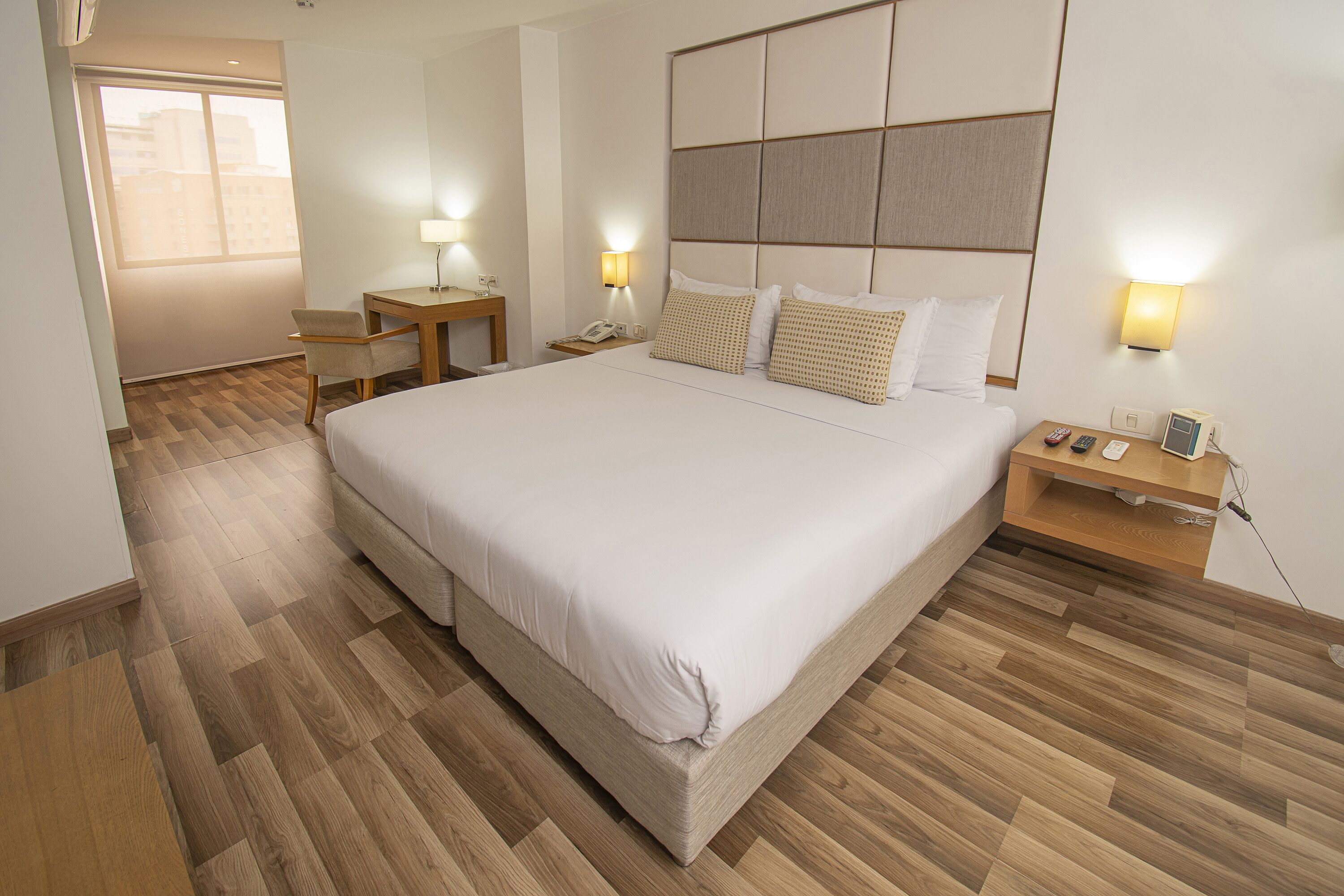 deluxe room | egyptian cotton sheets, down duvets, in-room safe, desk