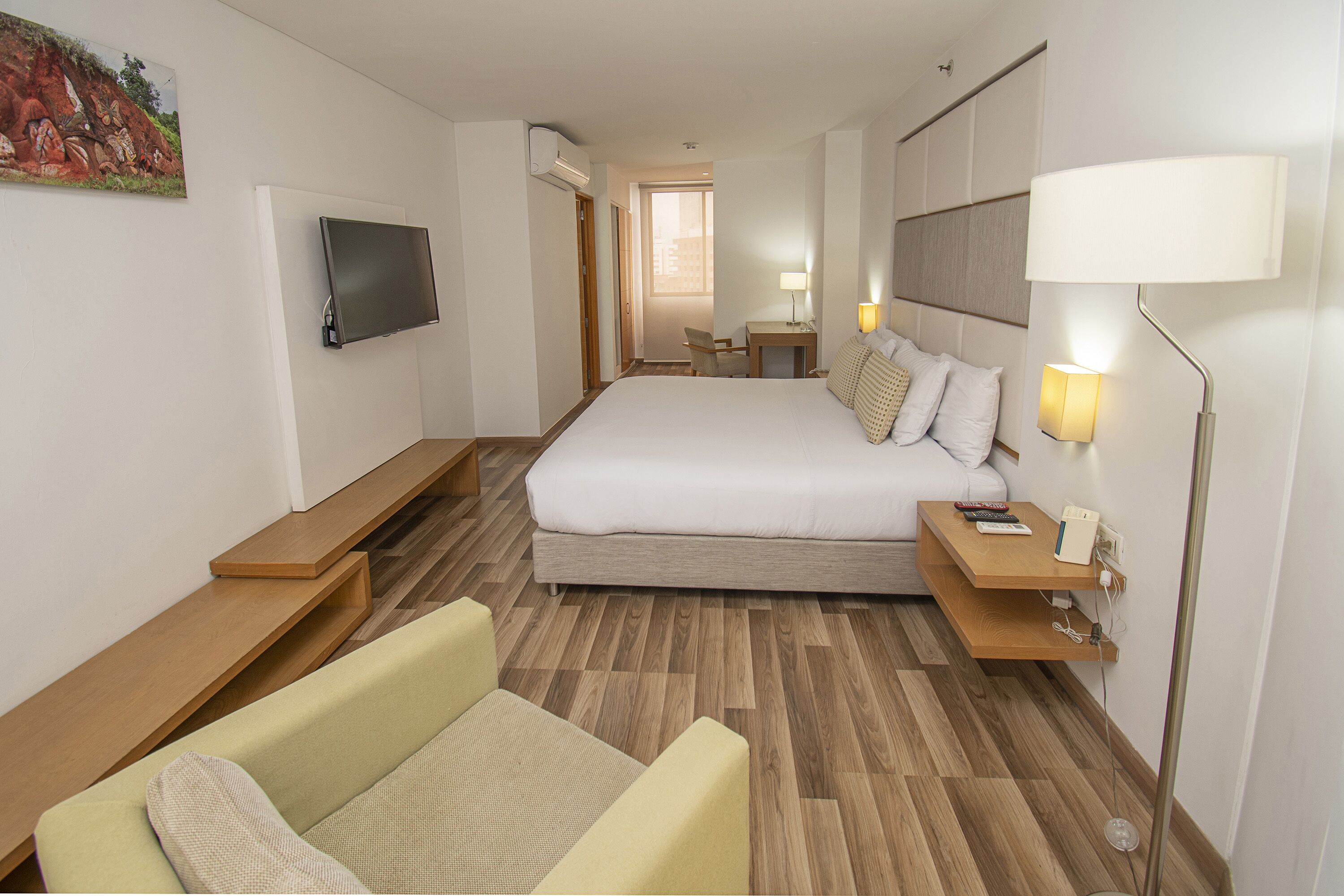 deluxe room | egyptian cotton sheets, down duvets, in-room safe, desk