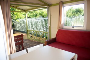 Two Bedroom Bungalow for 5 people | Living area | 16-inch TV with satellite channels - Camping Armanello (Benidorm)
