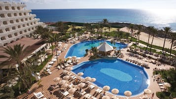 2 outdoor pools, pool umbrellas, sun loungers