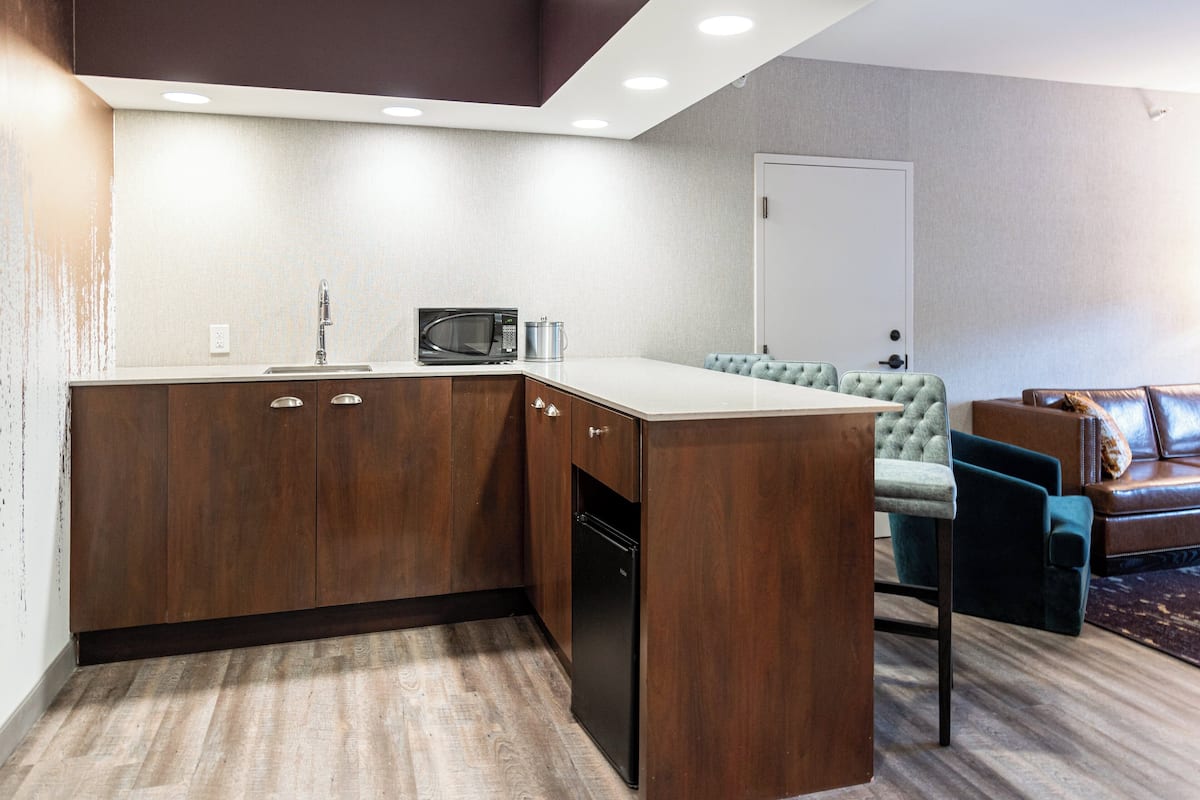 in-room safe, desk, blackout curtains, iron/ironing board