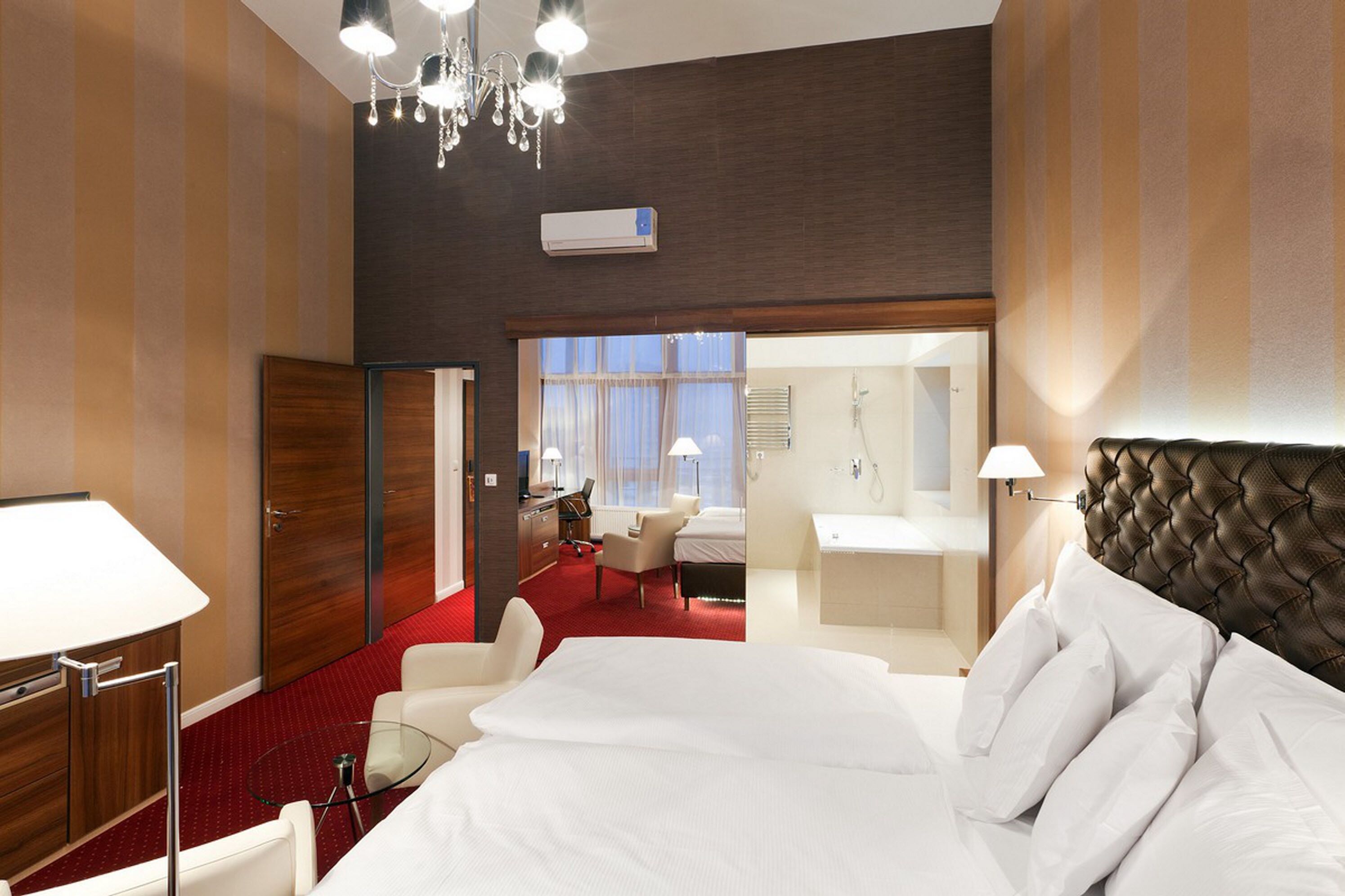 royal club double de luxe outdoor jacuzz | premium bedding, minibar, in-room safe, individually decorated