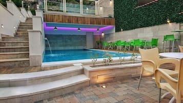 Seasonal outdoor pool, pool umbrellas