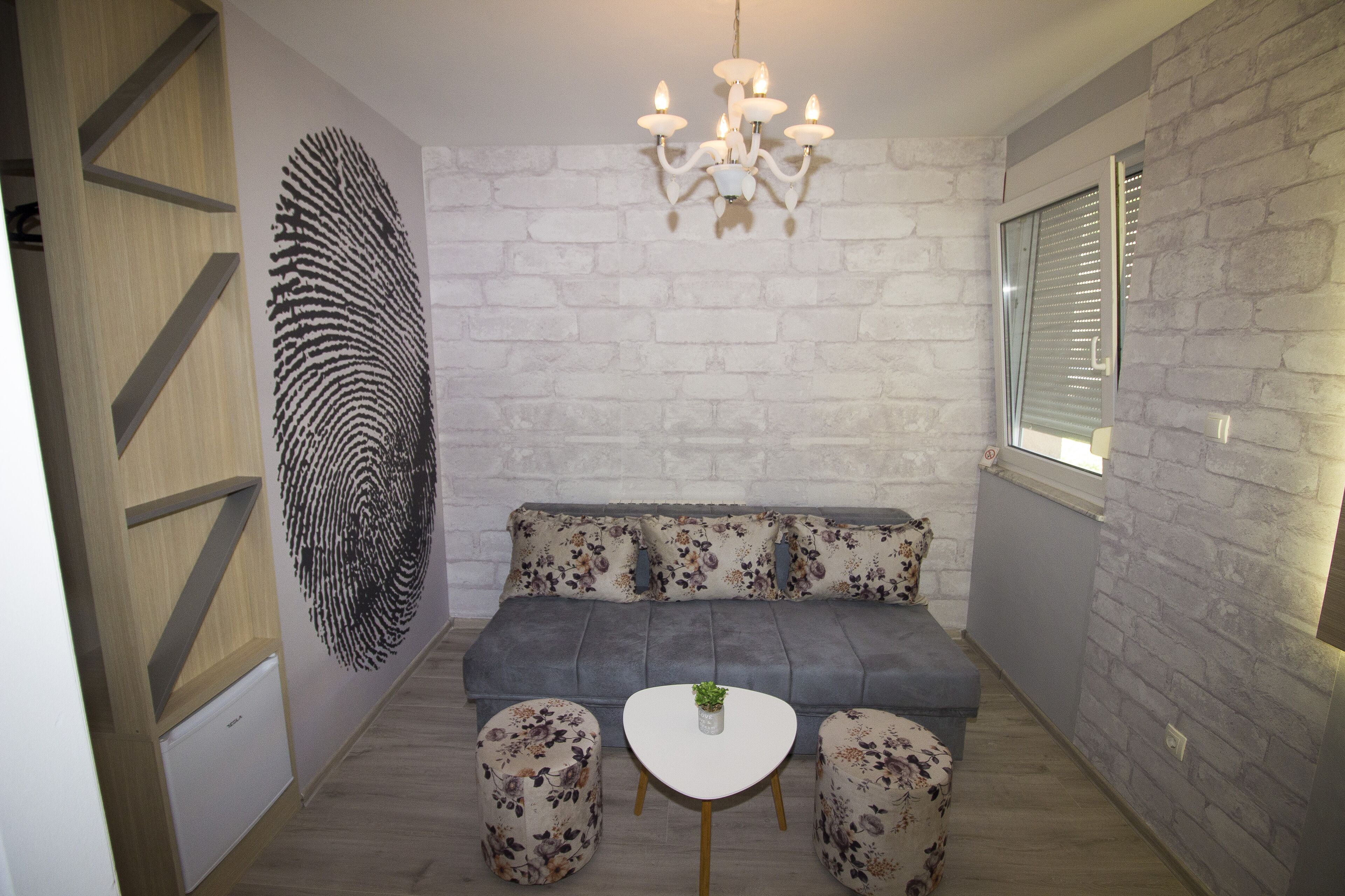Design Studio Suite, 1 Bedroom, Kitchen, Courtyard View | Living area | Flat-screen TV