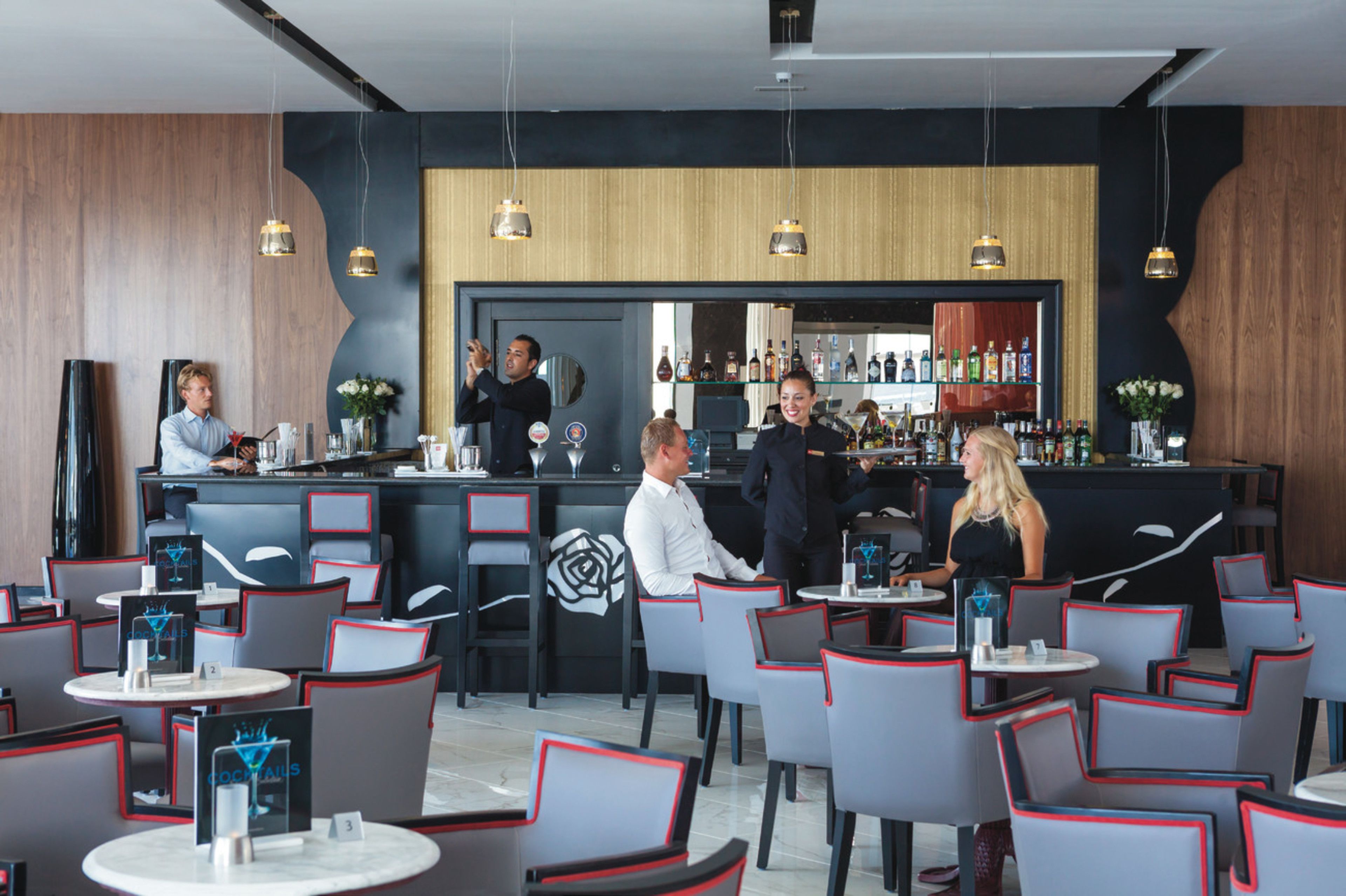 2 bars/lounges, poolside bar, beach bar