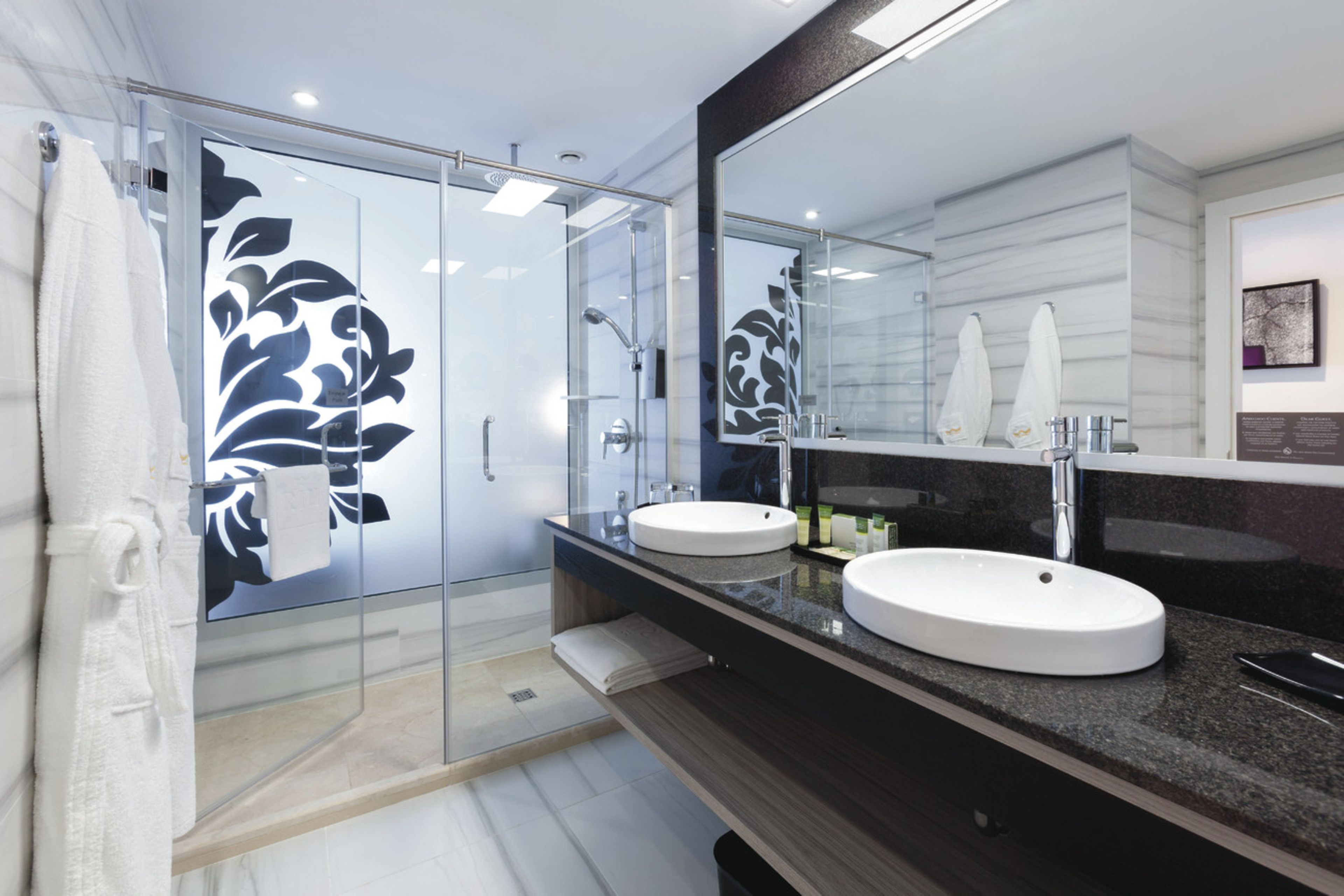 shower, eco-friendly toiletries, hair dryer, bathrobes