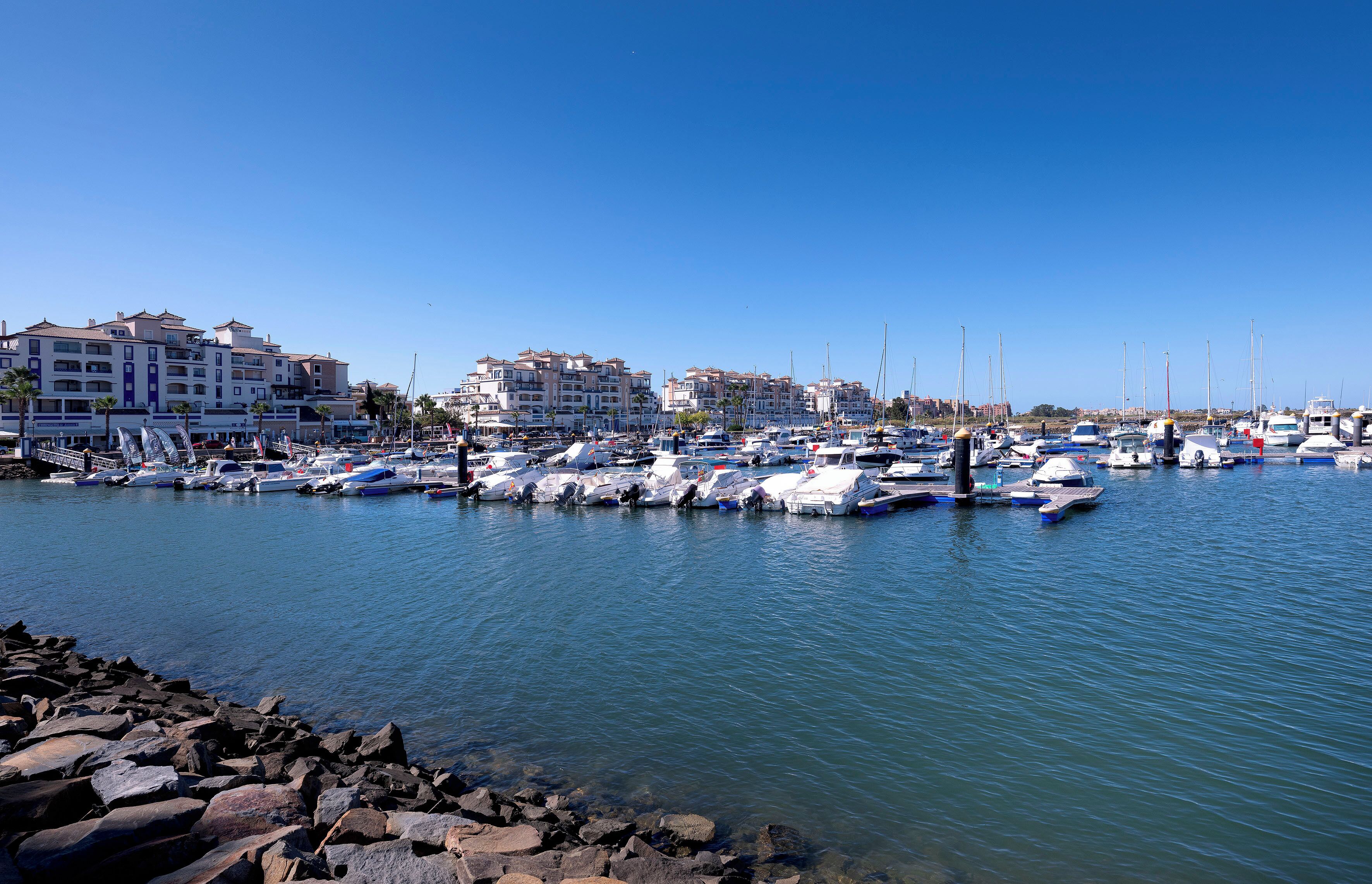 on the beach, sun-loungers, beach umbrellas, beach towels