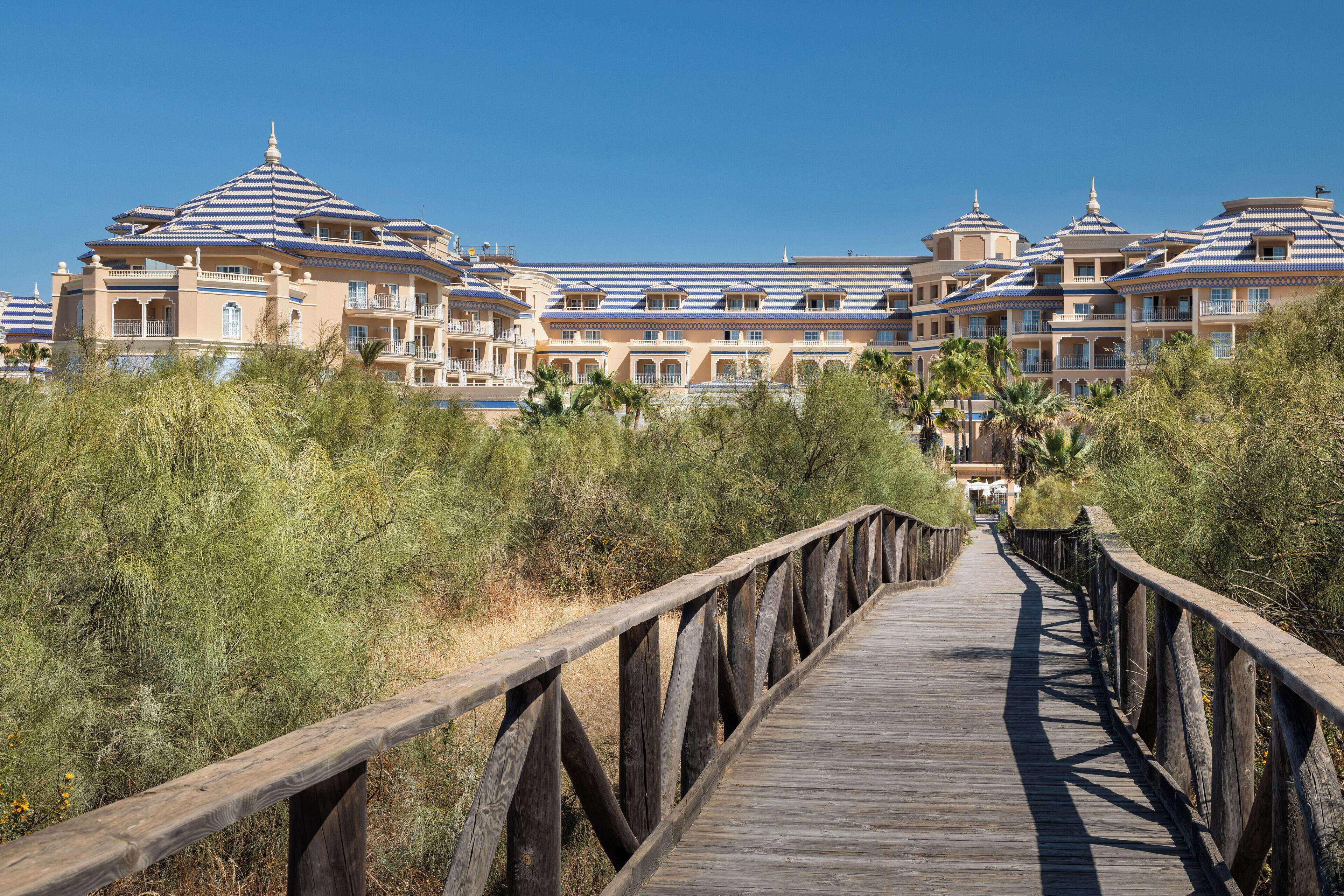 on the beach, sun-loungers, beach umbrellas, beach towels