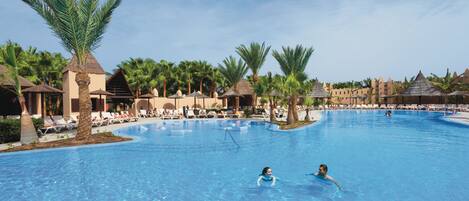 2 outdoor pools, pool umbrellas, pool loungers