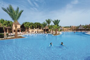 2 outdoor pools, pool umbrellas, pool loungers