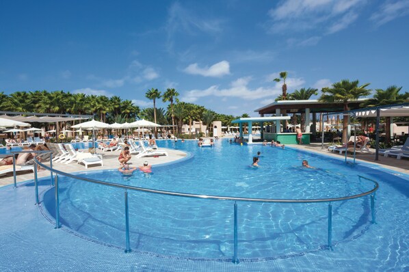 2 outdoor pools, pool umbrellas, pool loungers