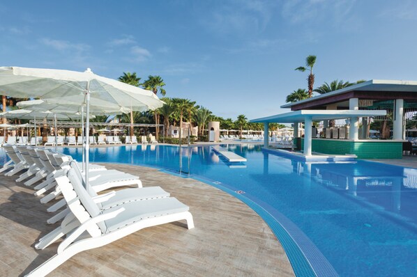 2 outdoor pools, pool umbrellas, pool loungers