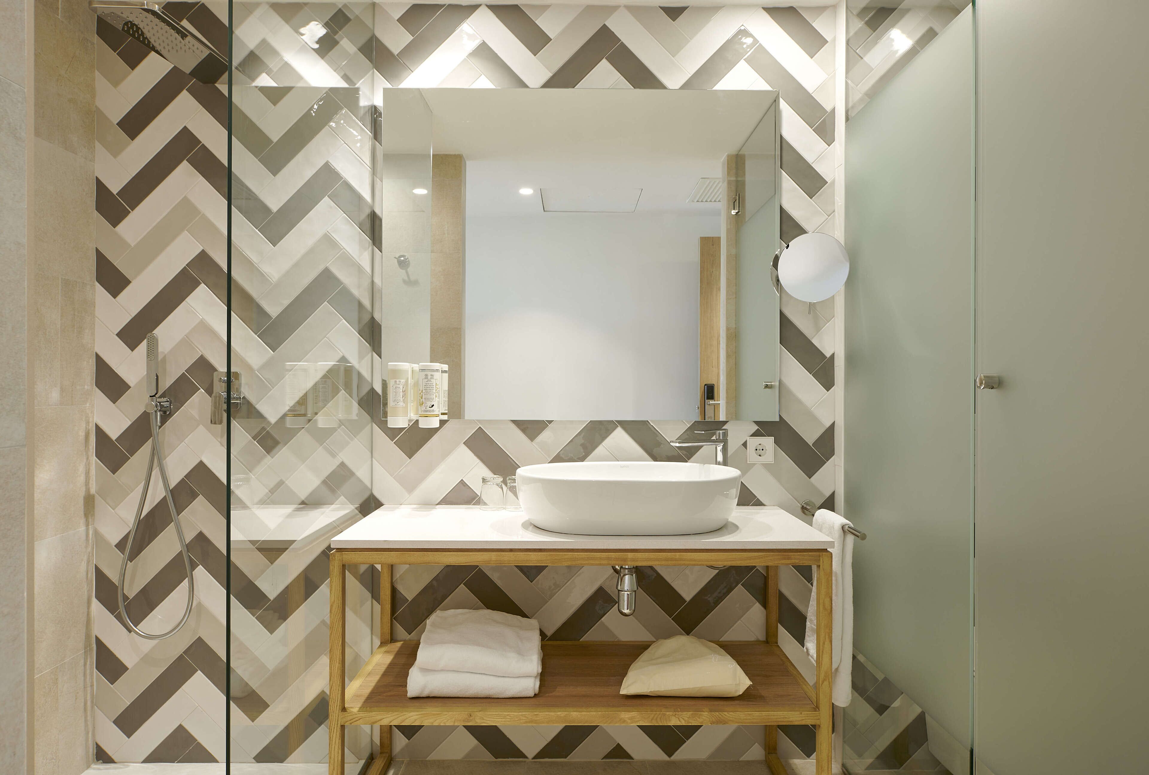 shower, eco-friendly toiletries, hair dryer, towels