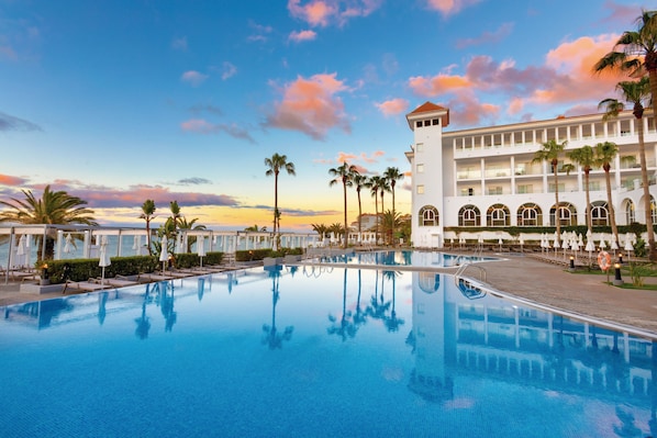 Indoor pool, 2 outdoor pools, pool umbrellas, pool loungers