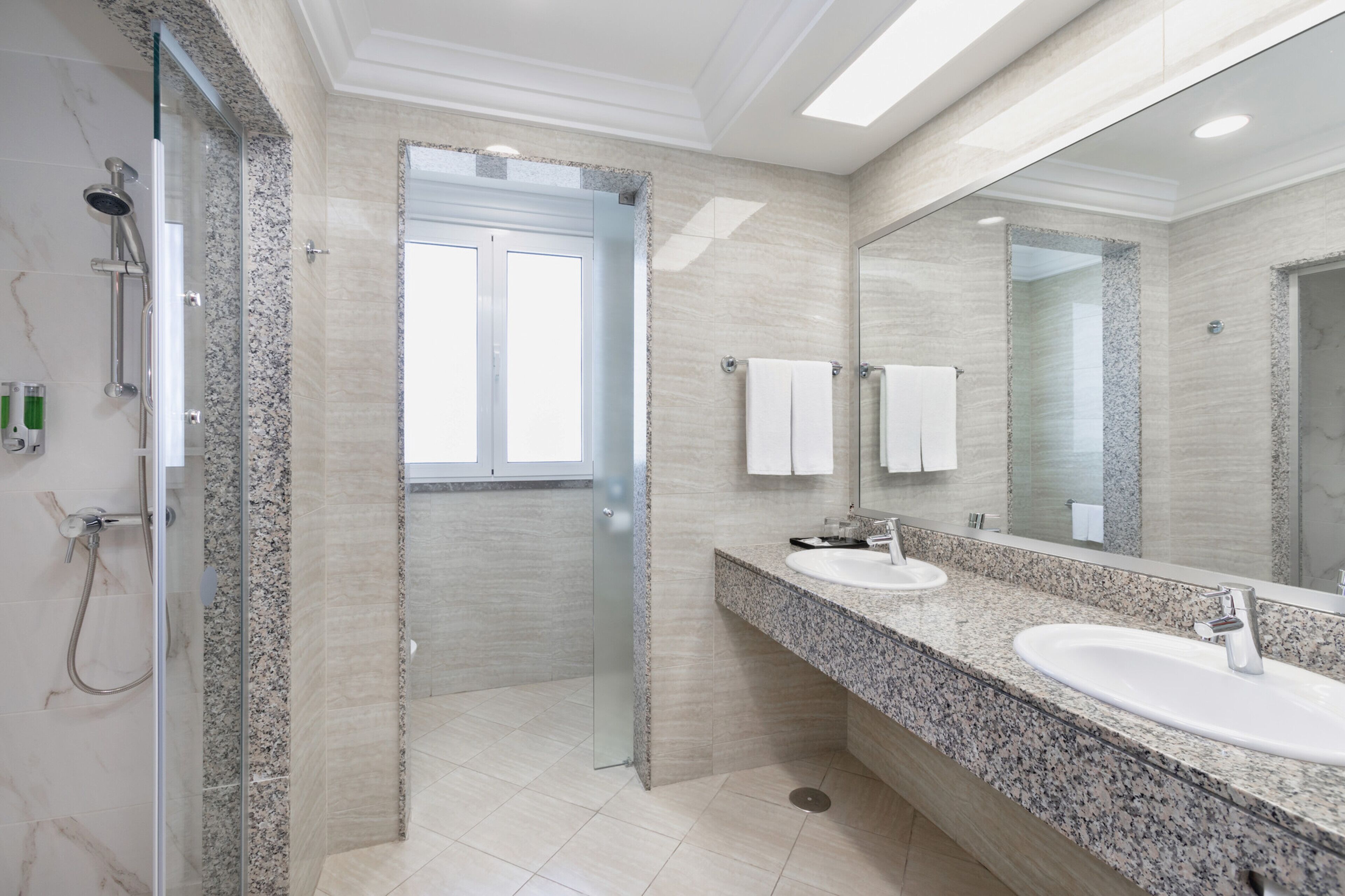 junior suite, balcony | bathroom | shower, eco-friendly toiletries, hair dryer, towels