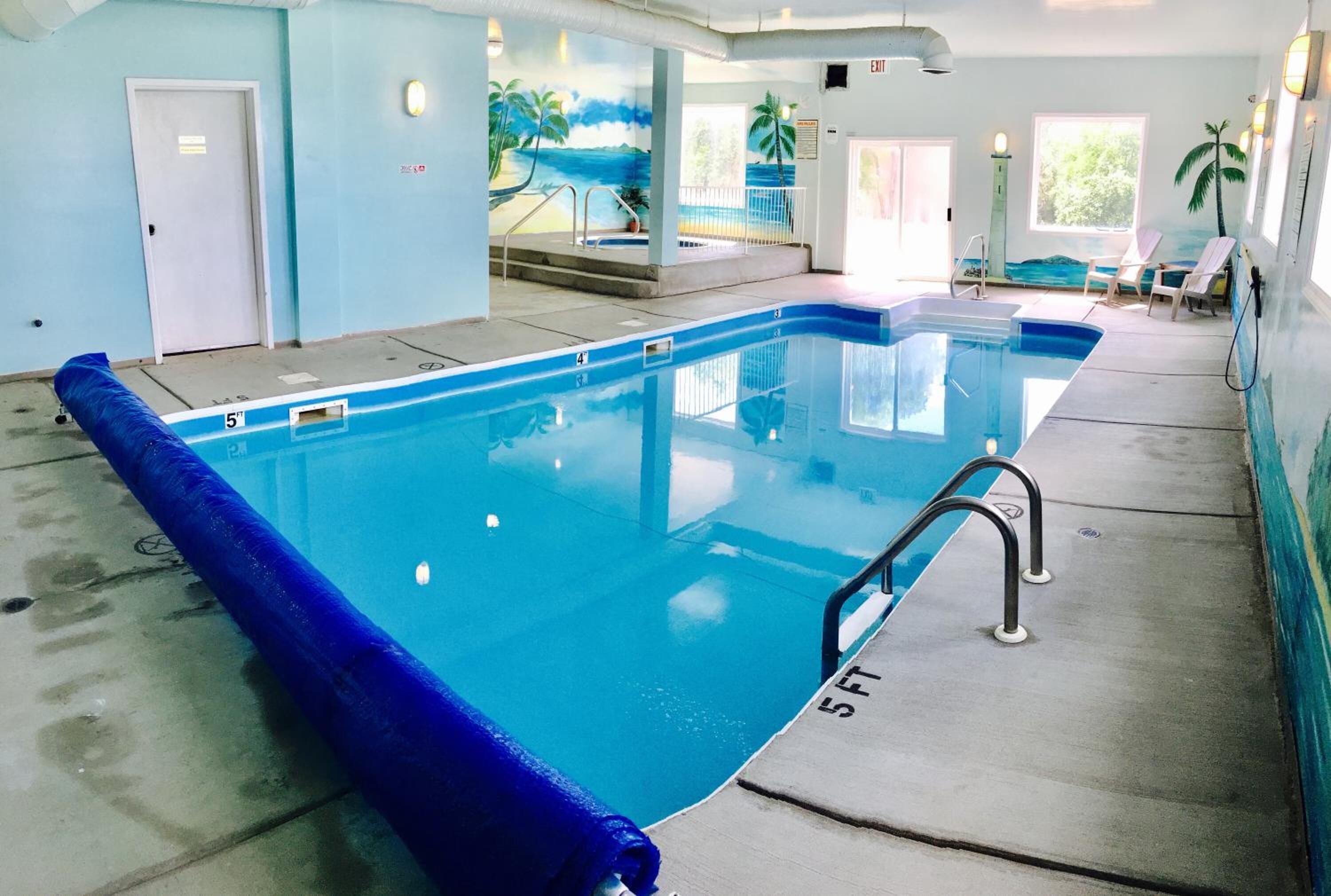 Indoor pool, open 8 AM to 10 PM, pool loungers