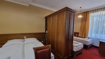 Quadruple Room, Courtyard View | In-room safe, desk, laptop workspace, blackout drapes